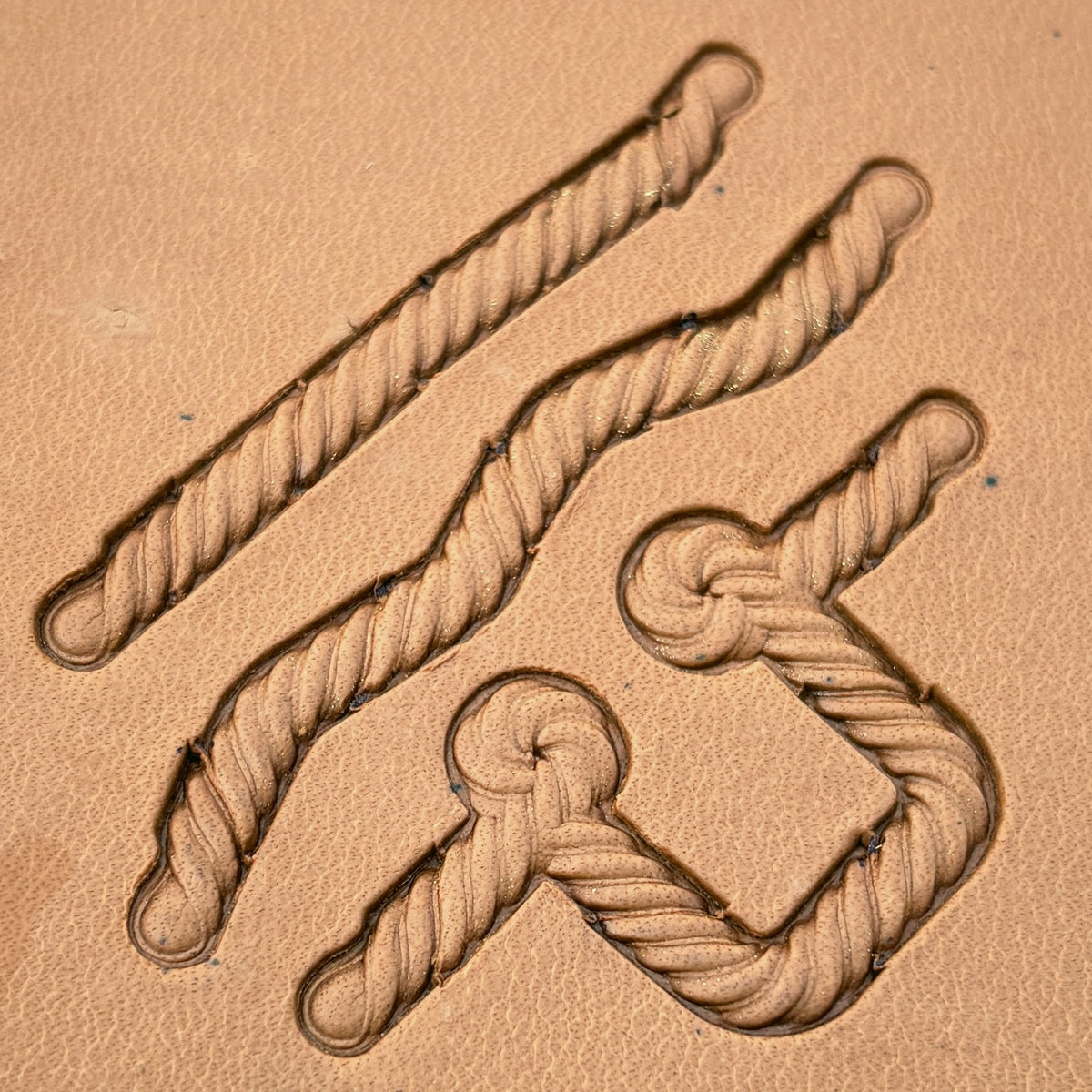 Fibre-Twist Rope leather stamp set LT430, straight runs, corners and ends combined into a border on leather