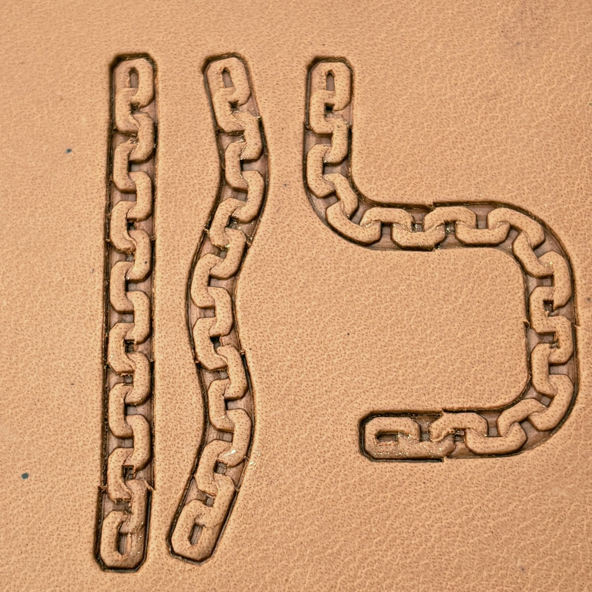 Box Link Chain leather stamp set LT431, straight runs, corners and ends combined into a border on leather