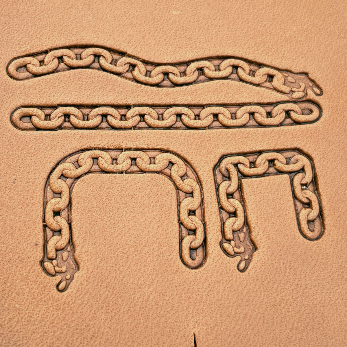 Oval Link Chain leather stamp set LT432, straight runs, corners and ends combined into a border on leather