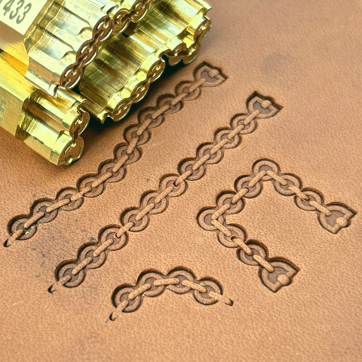 Round Link Chain leather stamp set LT433, straight runs, corners and ends combined into a border on leather