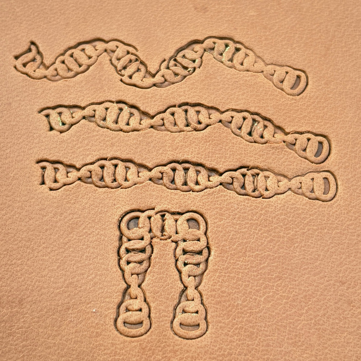 Double Link Chain leather stamp set LT436, straight runs, corners and ends combined into a border on leather