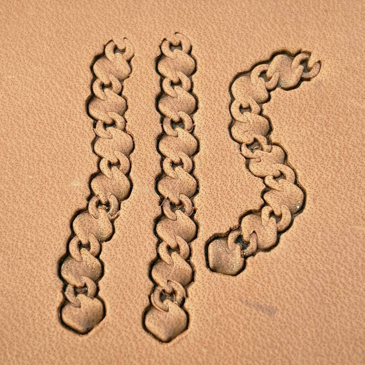 Heavy Curb Chain leather stamp set LT439, straight runs, corners and ends combined into a border on leather