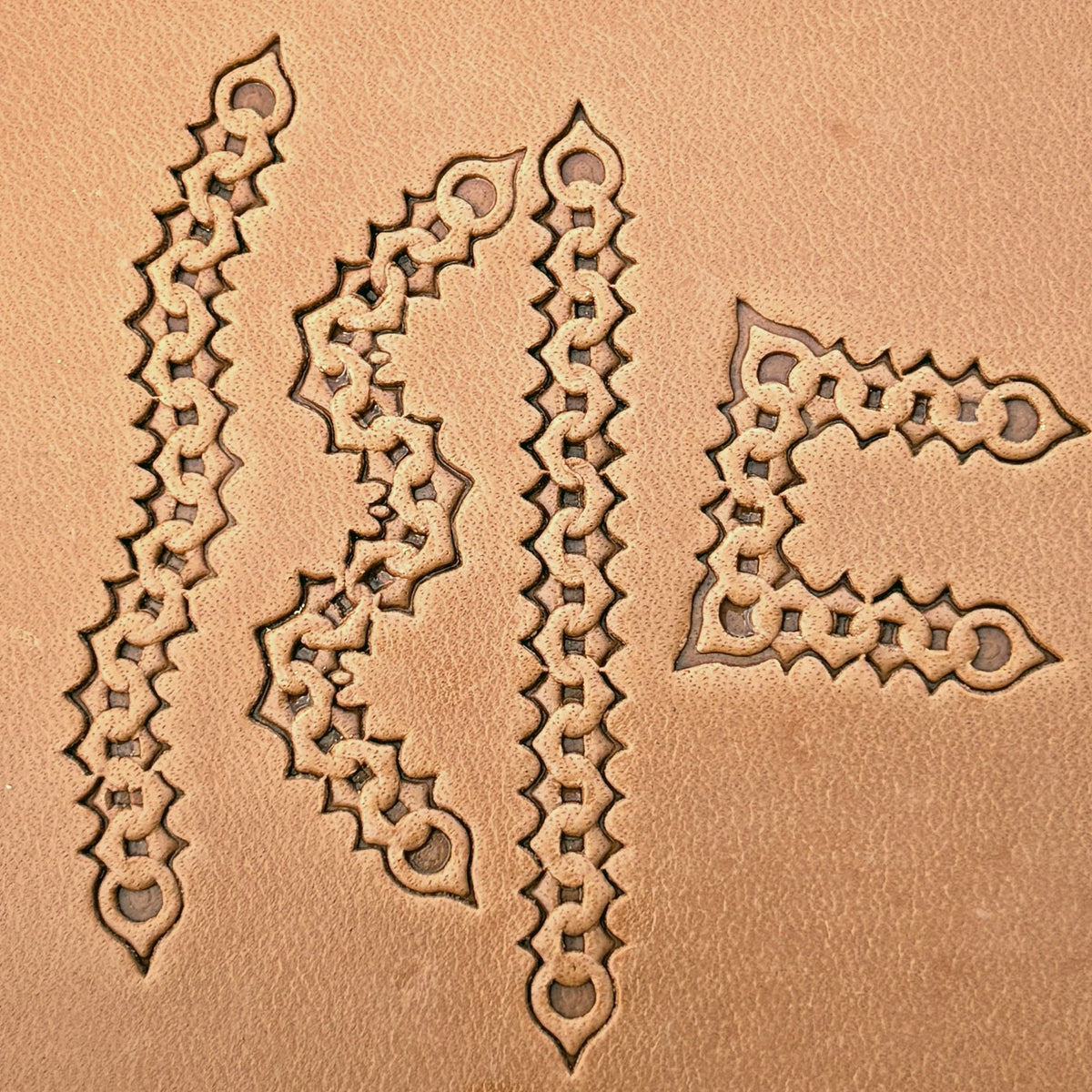 Spiked Chain leather stamp set LT442, straight runs, corners and ends combined into a border on leather