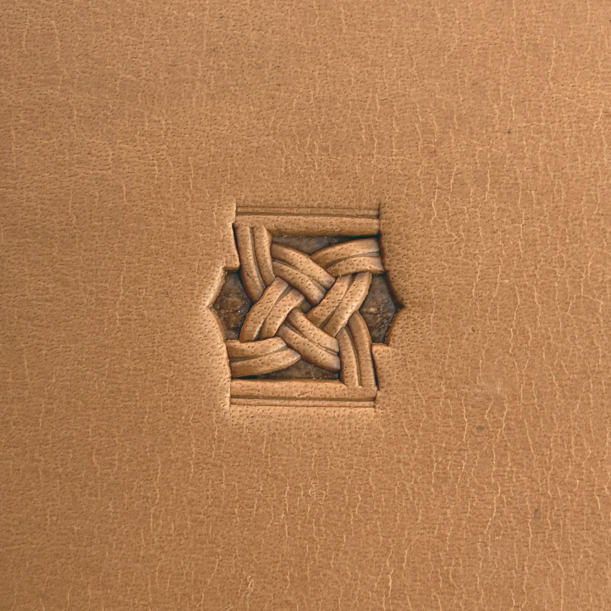 Celtic Knot Basket Weave leather stamp LT509 — single impression on veg-tan leather