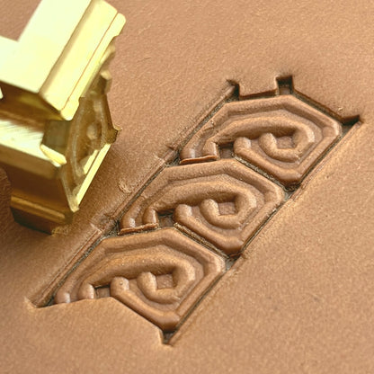 Knot Border Geometric leather stamp LT511 — brass stamping tool with imprint on natural veg-tan leather