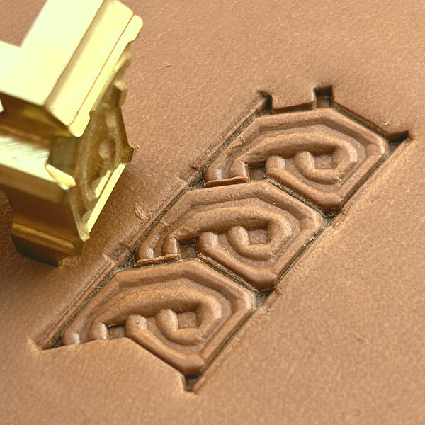 Knot Border Geometric leather stamp LT511 — brass stamping tool with imprint on natural veg-tan leather