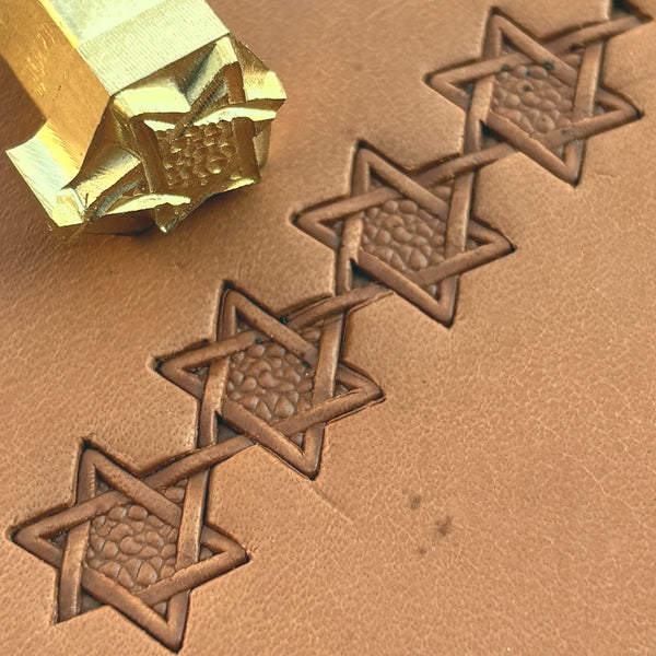 Interwoven Star Geometric leather stamp LT515 — brass stamping tool with imprint on natural veg-tan leather