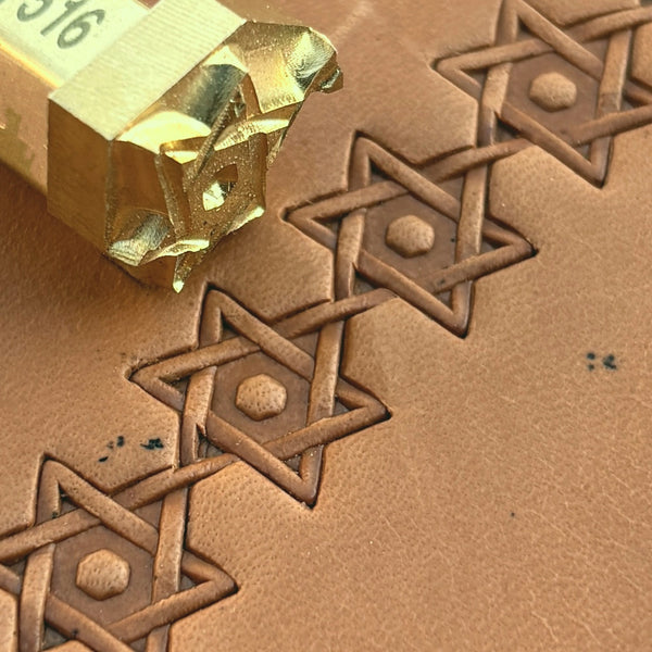 Interlocking Stars Geometric leather stamp LT516 — brass stamping tool with imprint on natural veg-tan leather