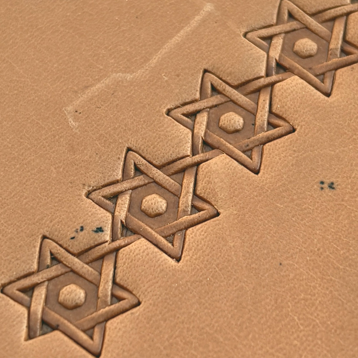Interlocking Stars Geometric leather stamp LT516 — pattern imprint on veg-tan leather