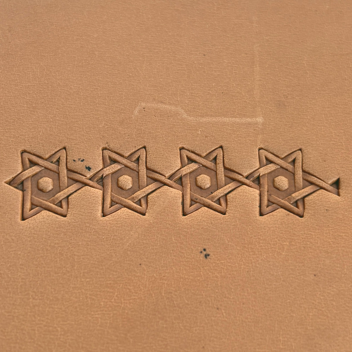 Interlocking Stars Geometric leather stamp LT516 — pattern imprint on veg-tan leather
