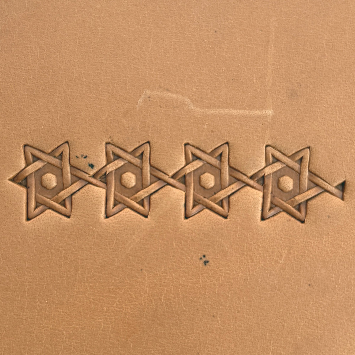 Interlocking Stars Geometric leather stamp LT516 — pattern imprint on veg-tan leather