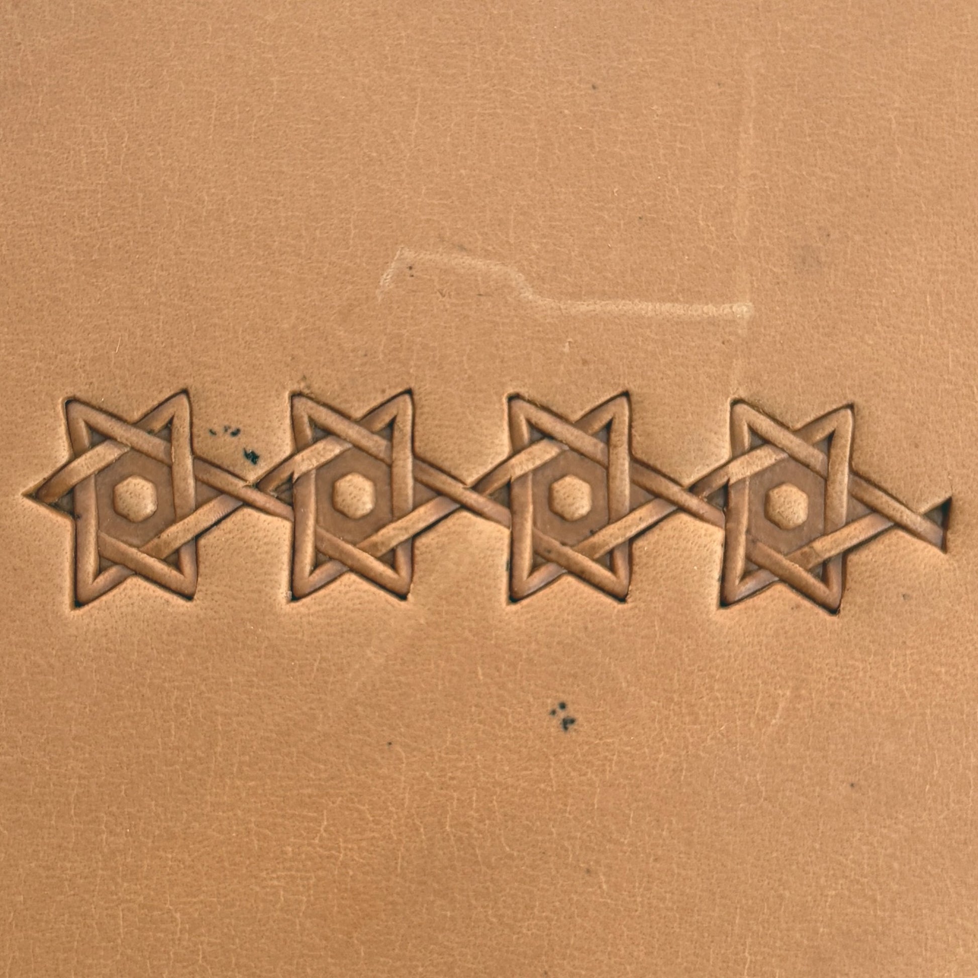 Interlocking Stars Geometric leather stamp LT516 — pattern imprint on veg-tan leather