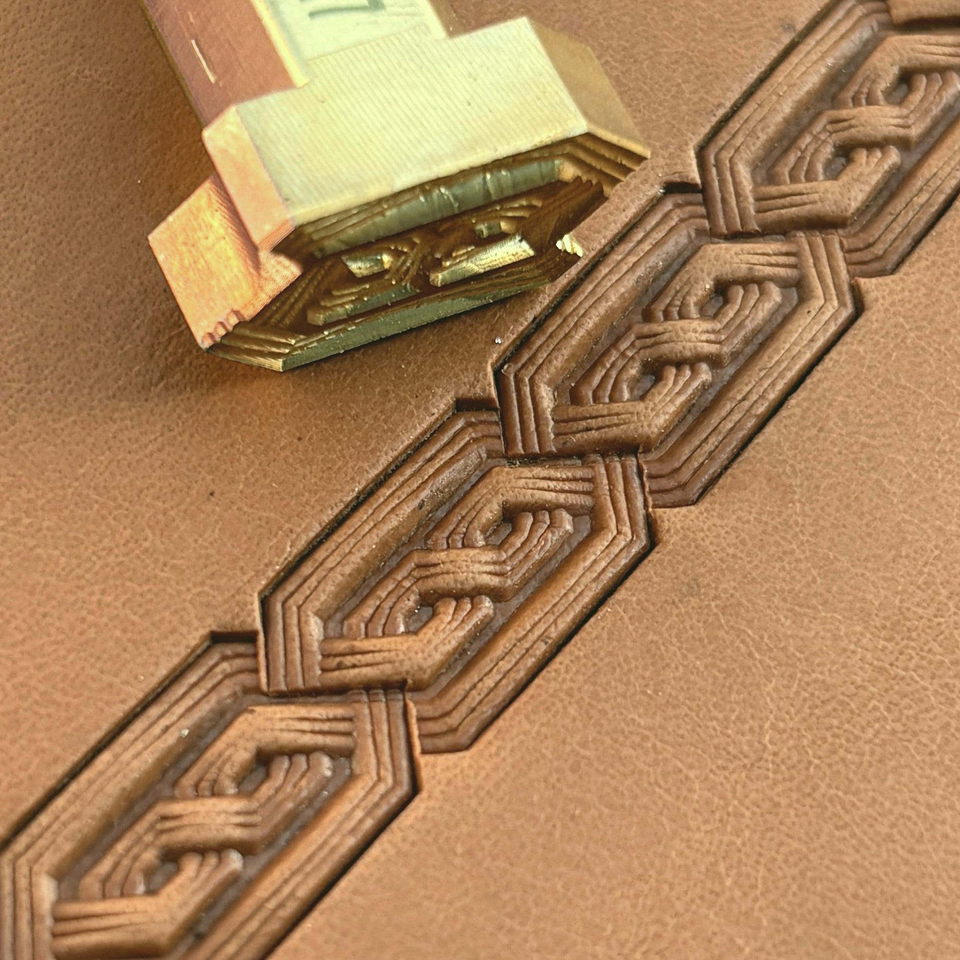 Chain Link Geometric leather stamp LT517 — brass stamping tool with imprint on natural veg-tan leather