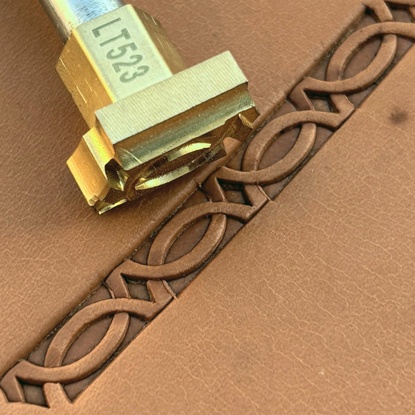 Chain Link Corner Geometric leather stamp LT523 — brass stamping tool with imprint on natural veg-tan leather