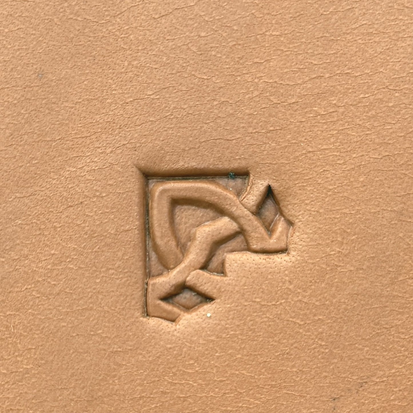Chain Link Corner Geometric leather stamp LT523 — single impression on veg-tan leather