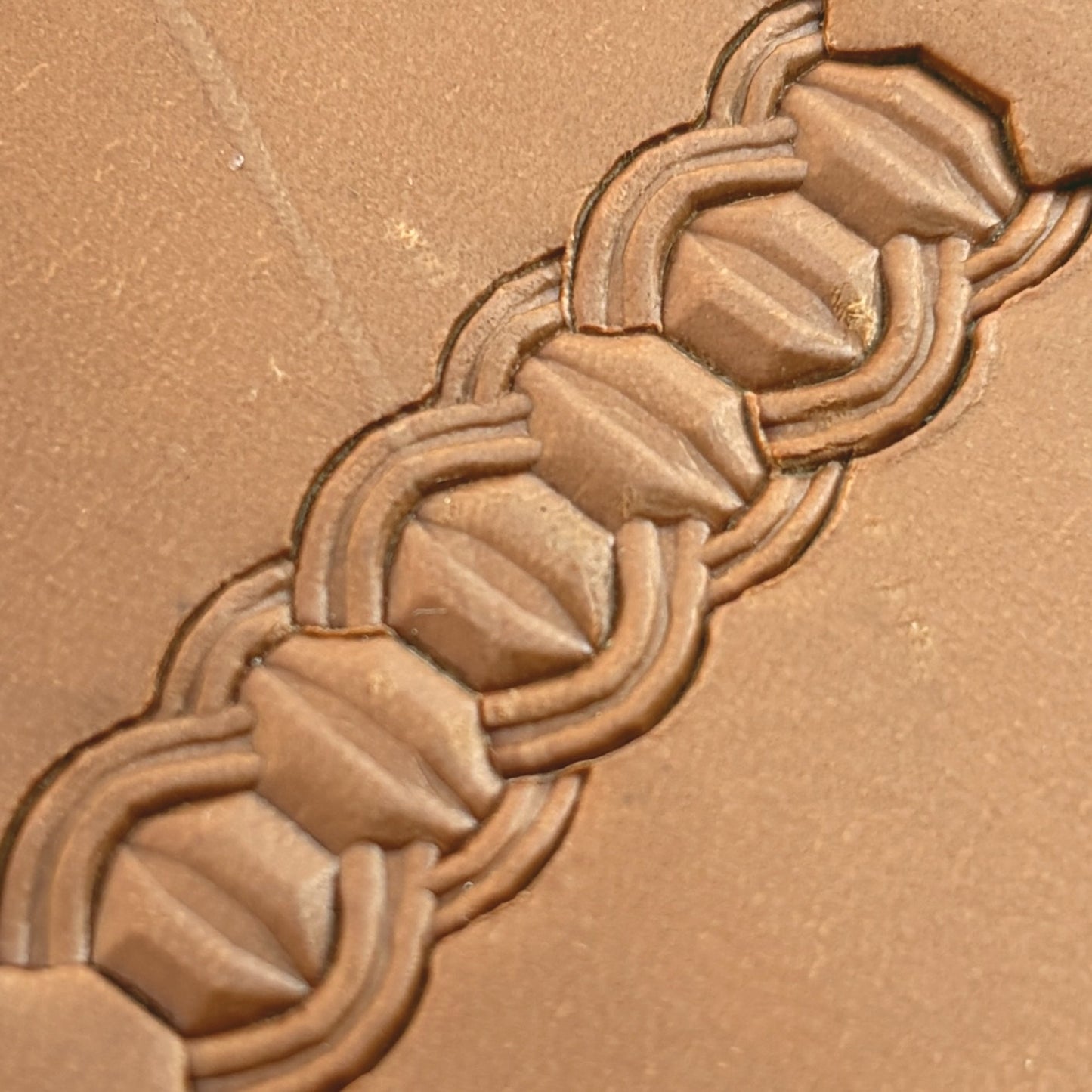 Interlock Geometric leather stamp LT525 — pattern imprint on veg-tan leather