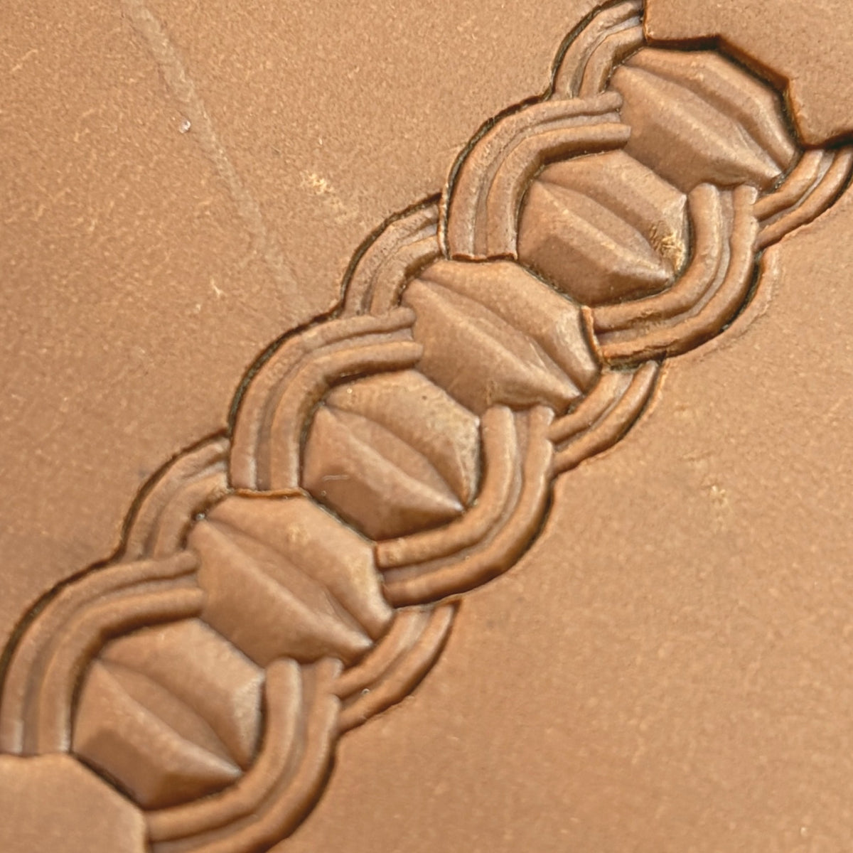 Interlock Geometric leather stamp LT525 — pattern imprint on veg-tan leather