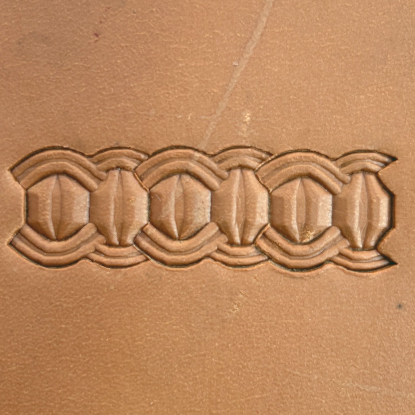 Interlock Geometric leather stamp LT525 — pattern imprint on veg-tan leather
