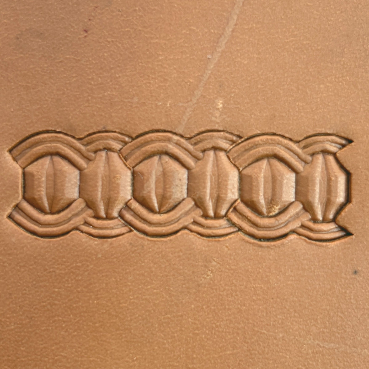 Interlock Geometric leather stamp LT525 — pattern imprint on veg-tan leather