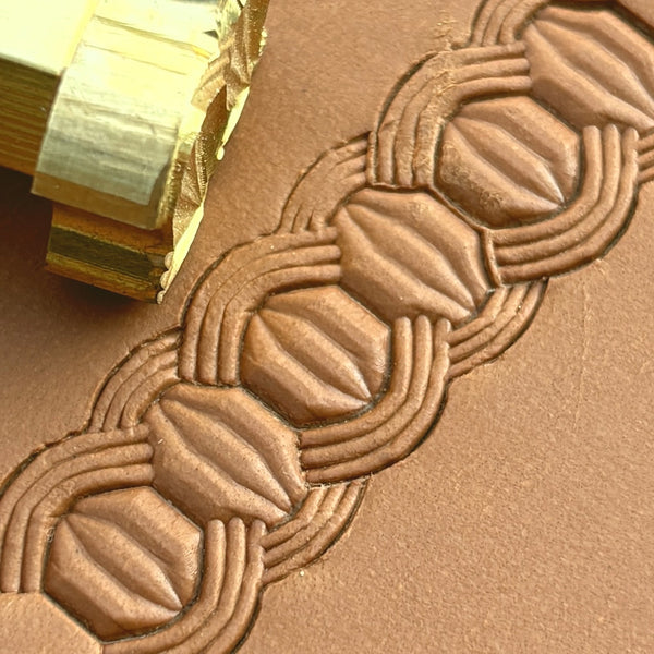 Interlocking Shapes Geometric leather stamp LT527 — brass stamping tool with imprint on natural veg-tan leather