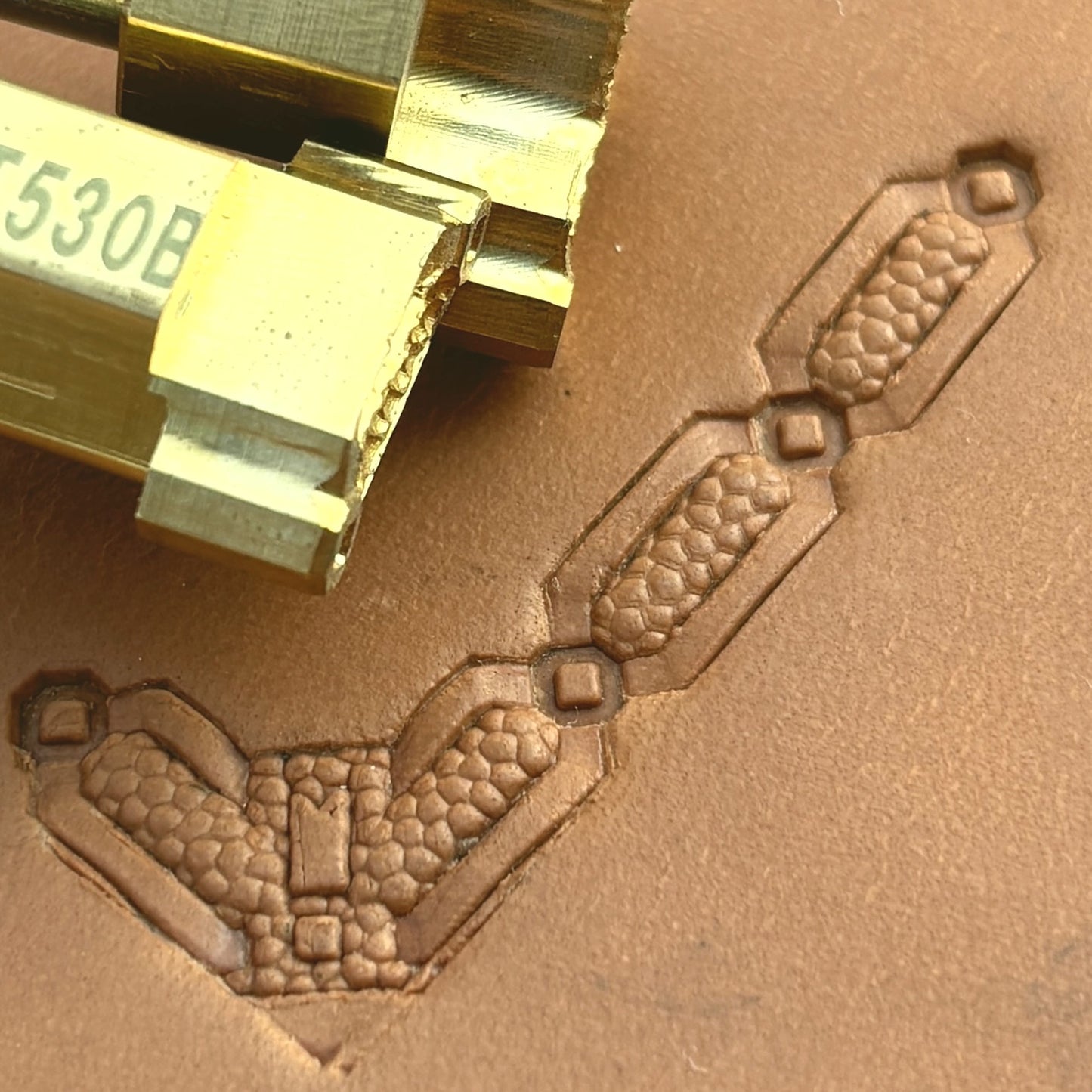 Honeycomb Link Geometric leather stamp LT530 — brass stamping tool with imprint on natural veg-tan leather