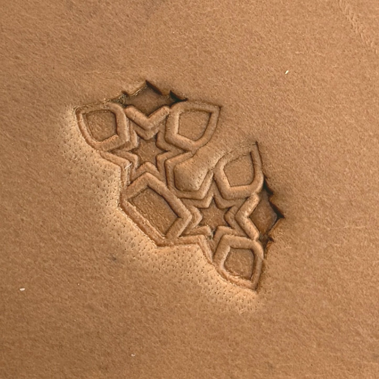 Star Cluster Geometric leather stamp LT532 — single impression on veg-tan leather