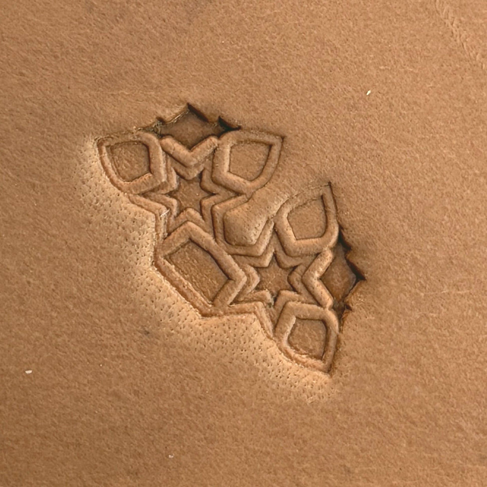Star Cluster Geometric leather stamp LT532 — single impression on veg-tan leather