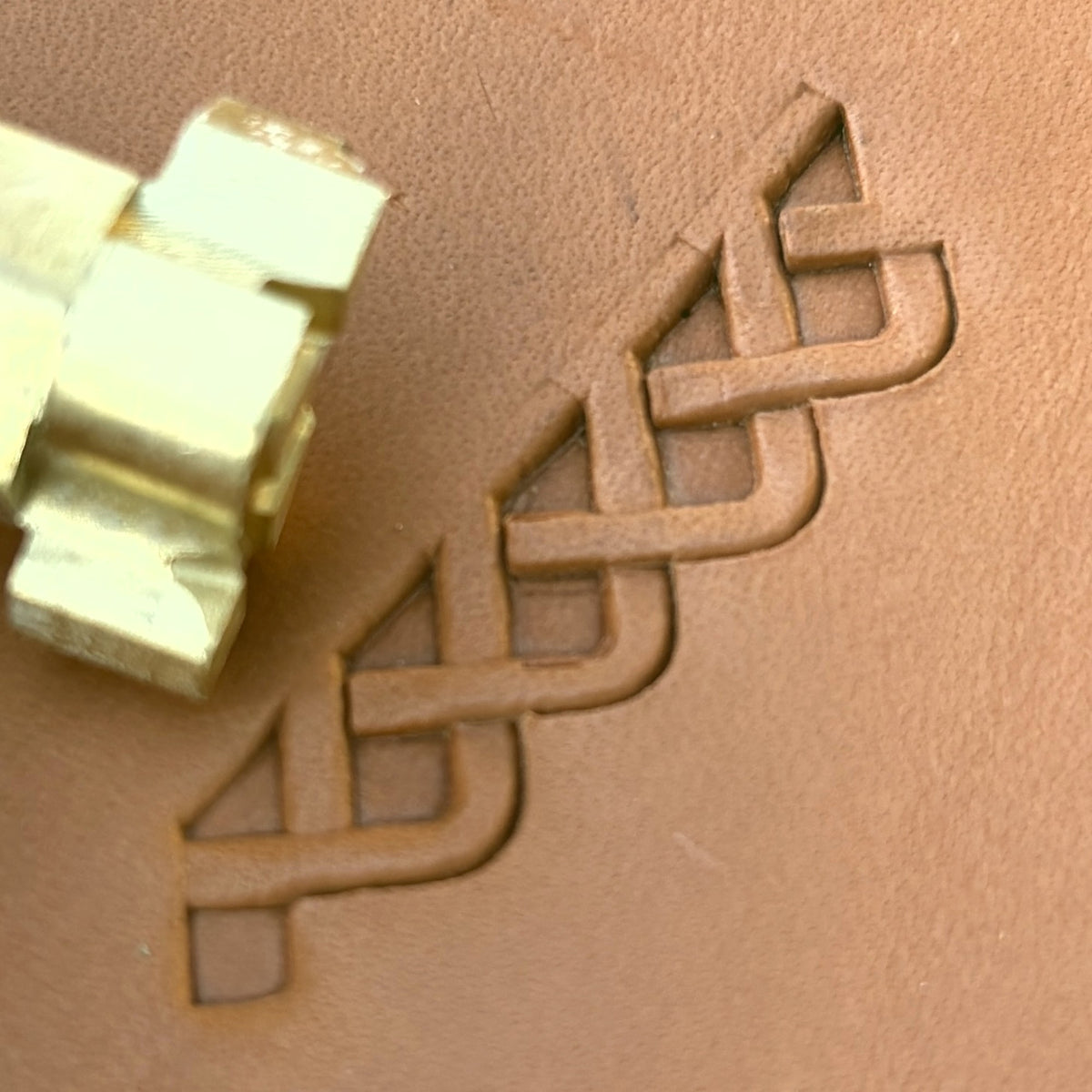 Braided Line Basket Weave leather stamp LT543 — brass stamping tool with imprint on natural veg-tan leather