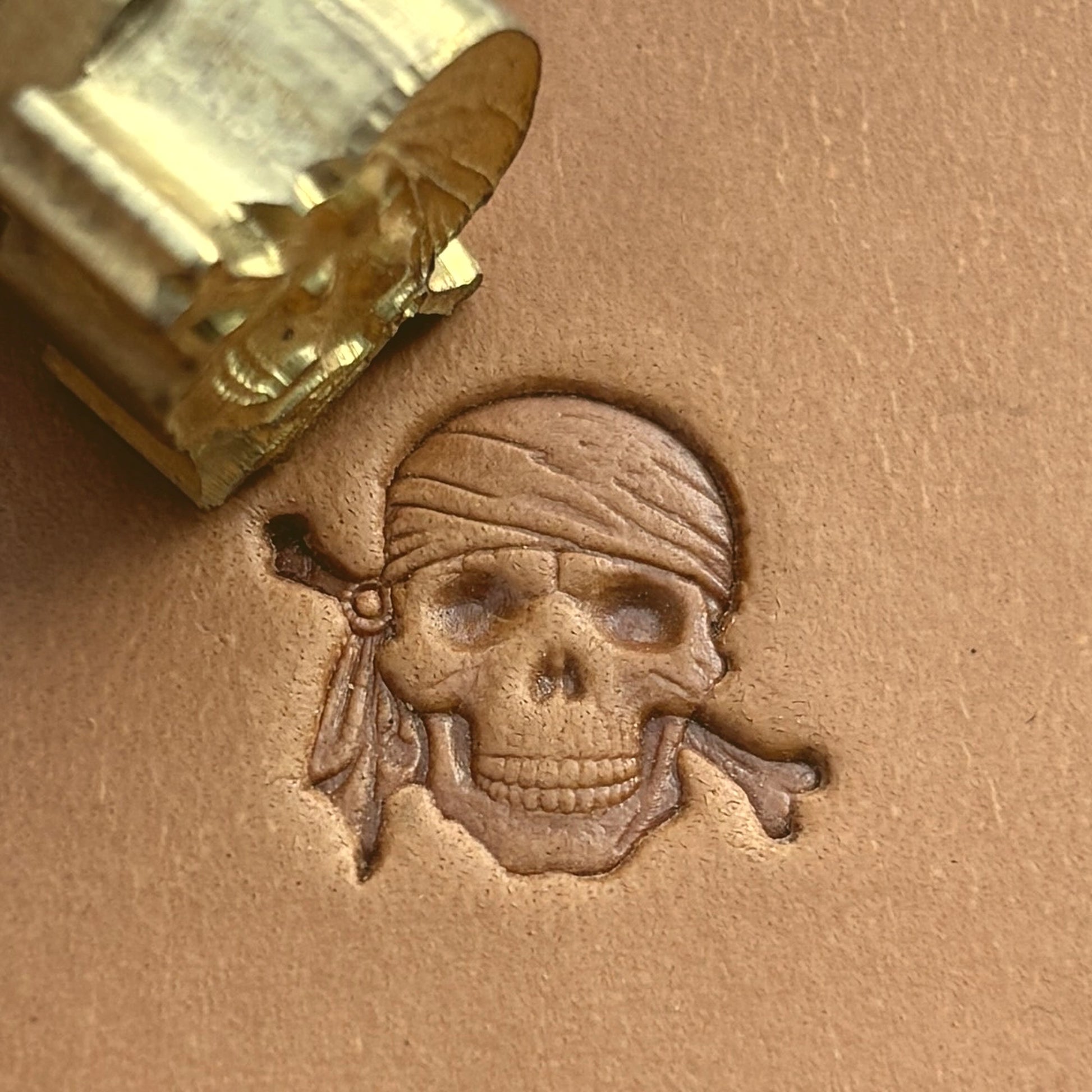 Pirate Skull leather stamp LT551 — brass stamping tool with imprint on natural veg-tan leather