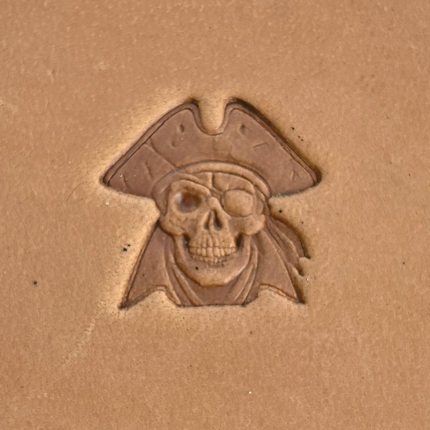 Pirate Captain Skull leather stamp LT554 — single impression on veg-tan leather