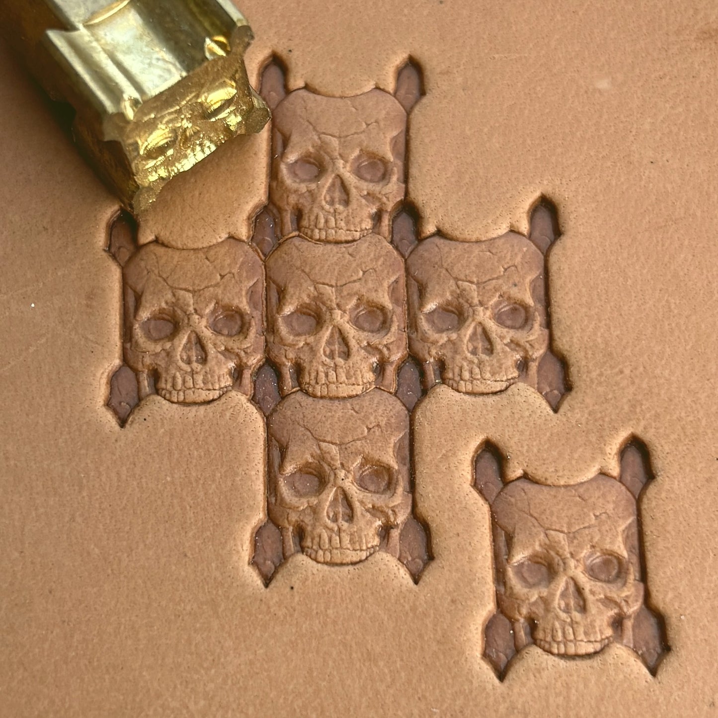 Crossbones Skull leather stamp LT555 — brass stamping tool with imprint on natural veg-tan leather