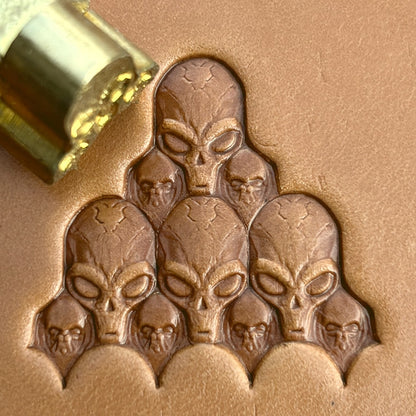 Alien Cluster Skull leather stamp LT568 — brass stamping tool with imprint on natural veg-tan leather