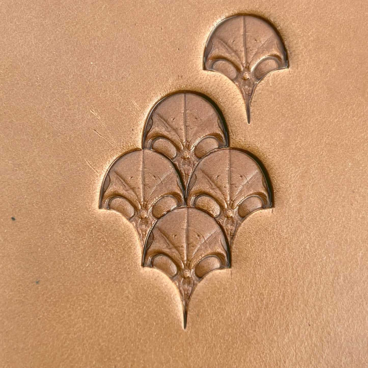 Alien Head leather stamp LT570 — pattern imprint on veg-tan leather