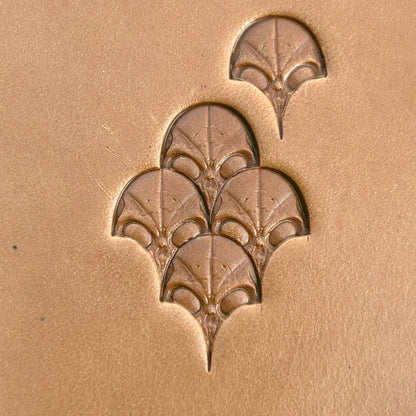Alien Head leather stamp LT570 — pattern imprint on veg-tan leather