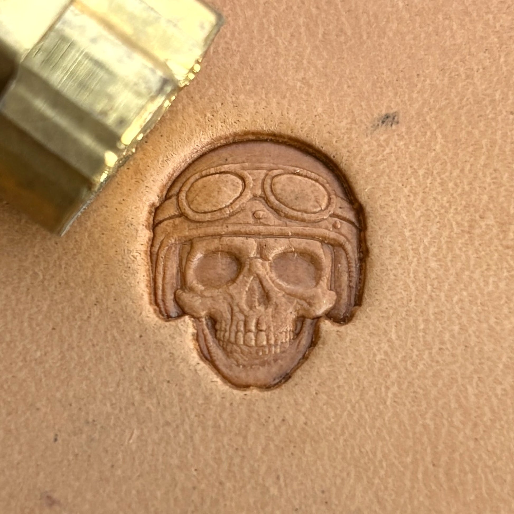 Biker Helmet Skull leather stamp LT573 — brass stamping tool with imprint on natural veg-tan leather