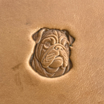 Bulldog Face leather stamp LT579 — single impression on veg-tan leather