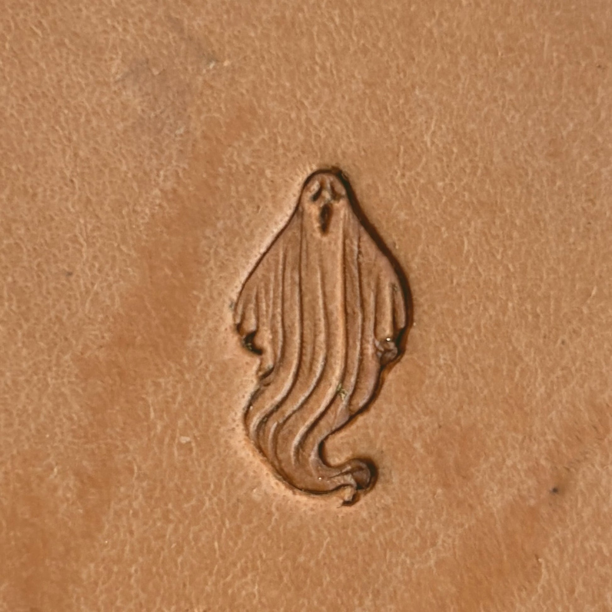 Ghost Pattern leather stamp LT585 — single impression on veg-tan leather