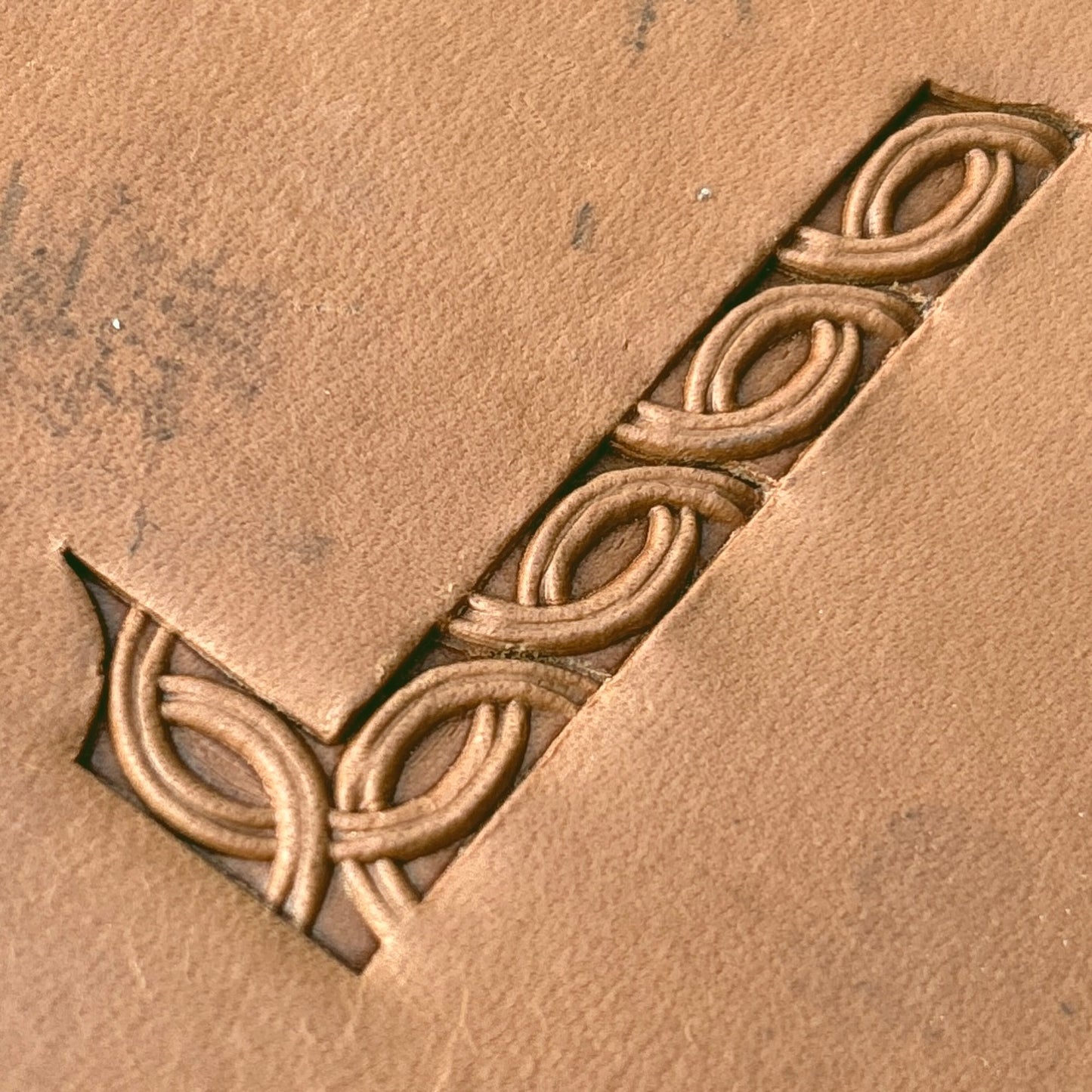 Interlaced Geometric leather stamp LT597 — pattern imprint on veg-tan leather