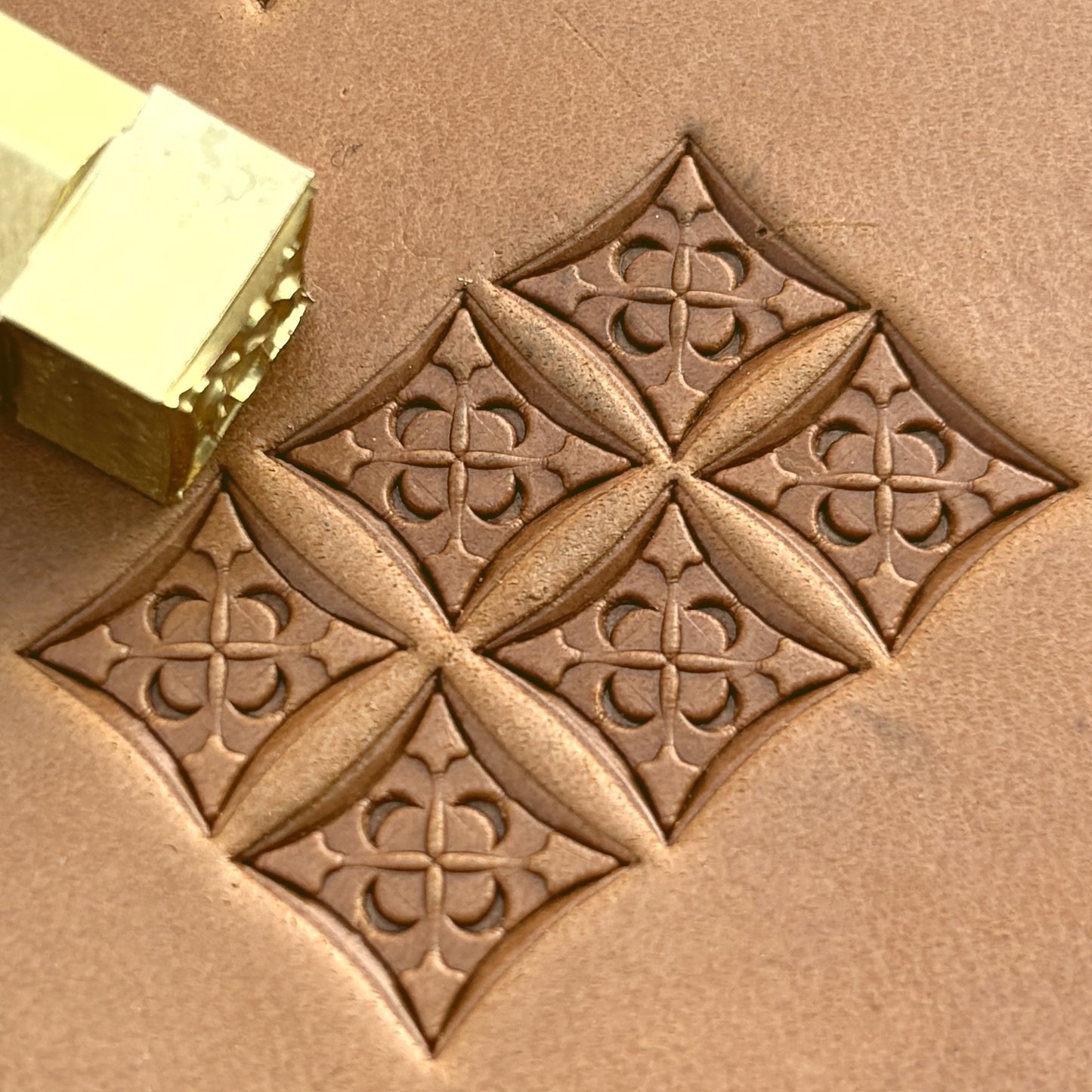 Floral Tile leather stamp LT600 — brass stamping tool with imprint on natural veg-tan leather