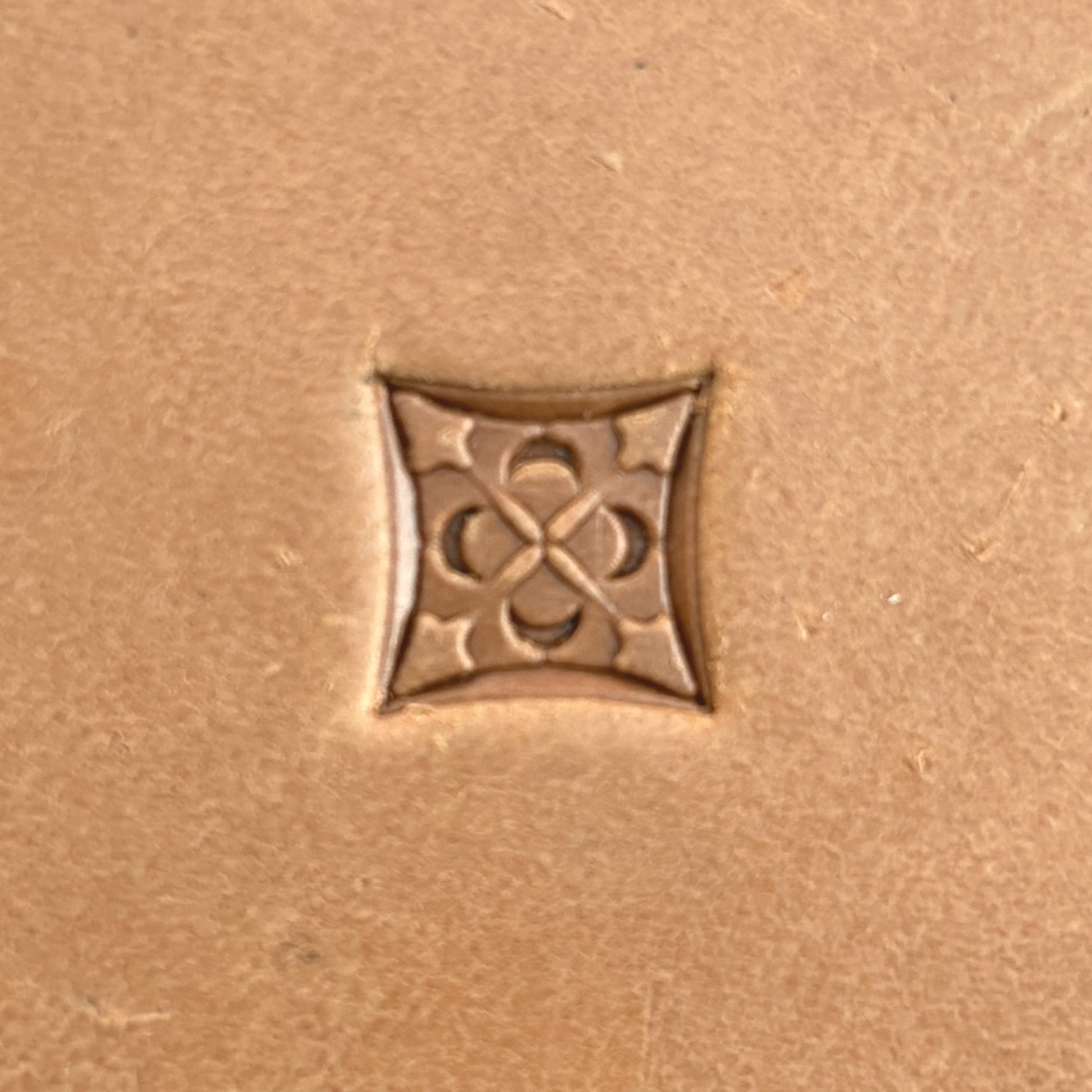 Floral Tile leather stamp LT600 — single impression on veg-tan leather
