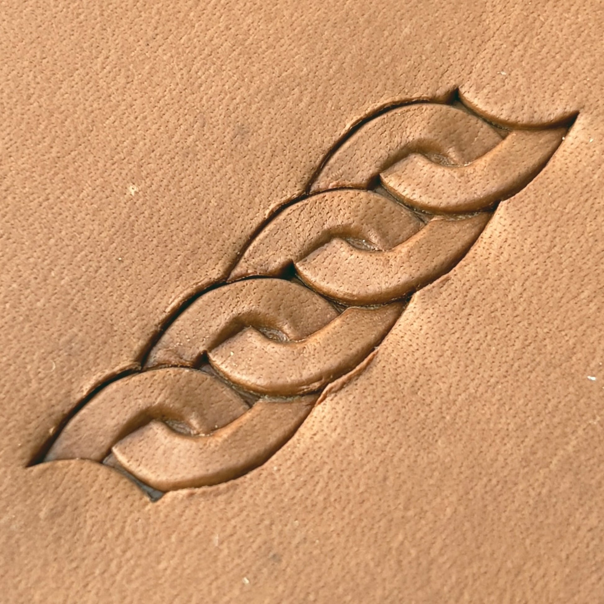 Interlocking Loop leather stamp LT601 — pattern imprint on veg-tan leather