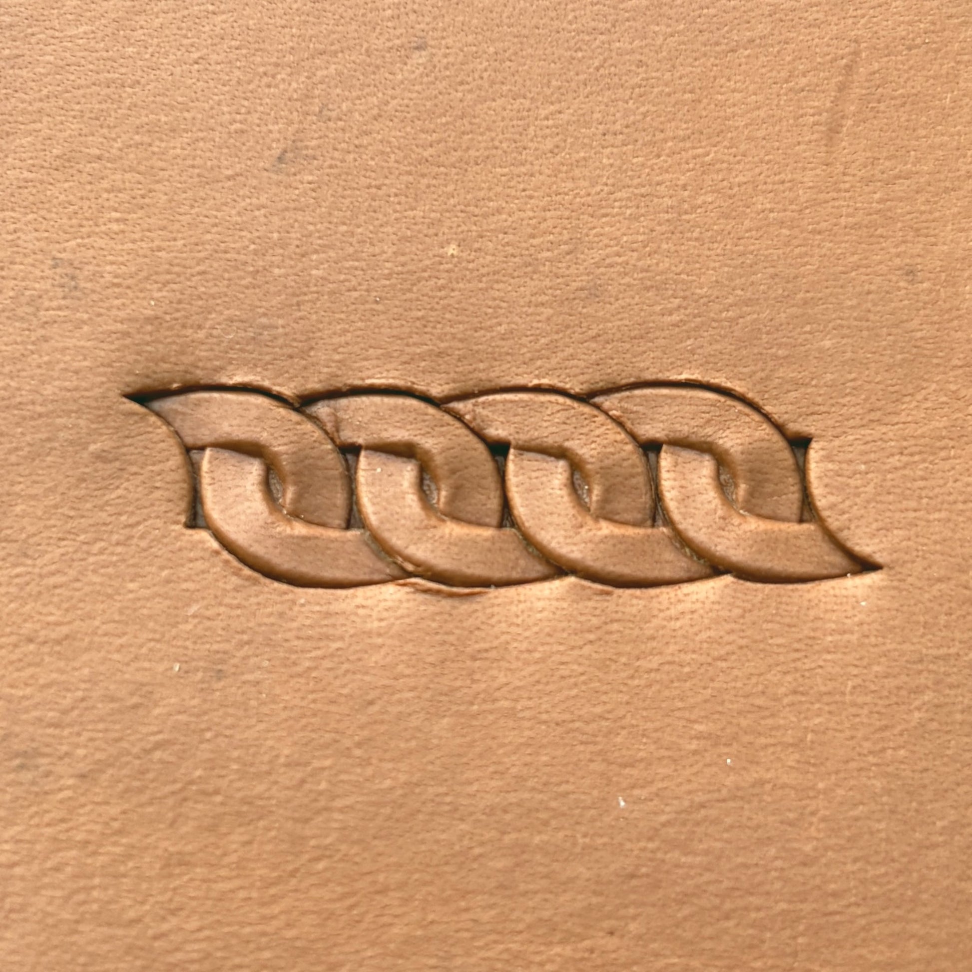 Interlocking Loop leather stamp LT601 — pattern imprint on veg-tan leather