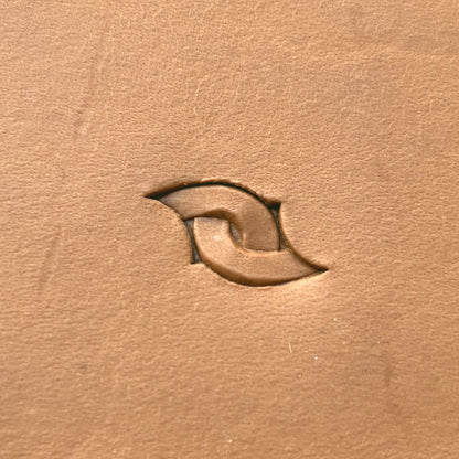 Interlocking Loop leather stamp LT601 — single impression on veg-tan leather