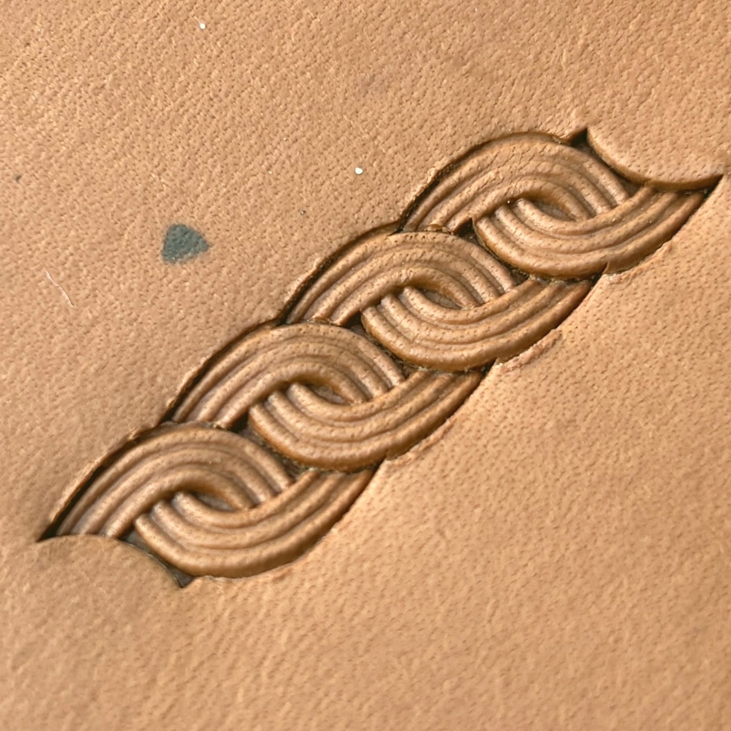 Interlock Basket Weave leather stamp LT602 — pattern imprint on veg-tan leather