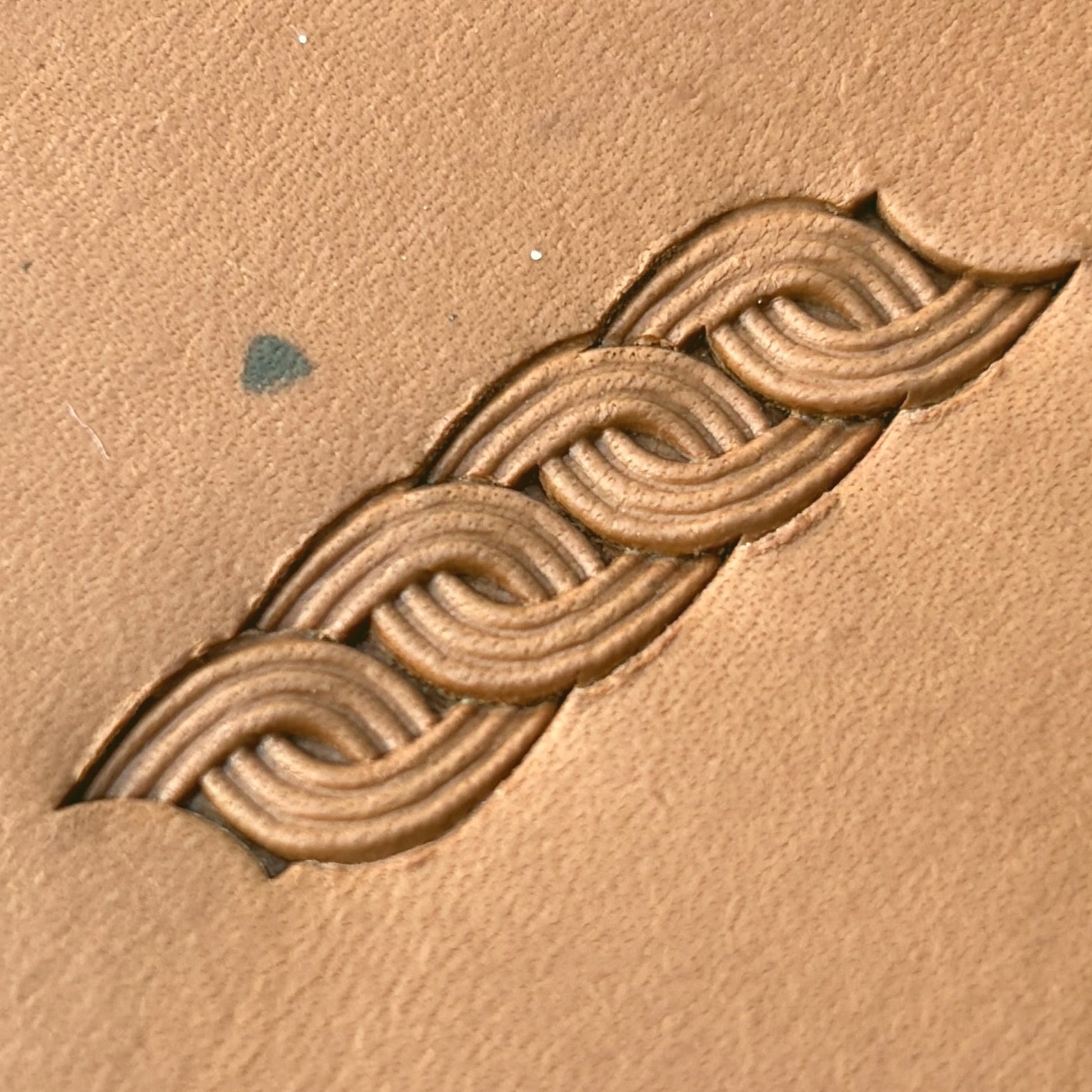 Interlock Basket Weave leather stamp LT602 — pattern imprint on veg-tan leather