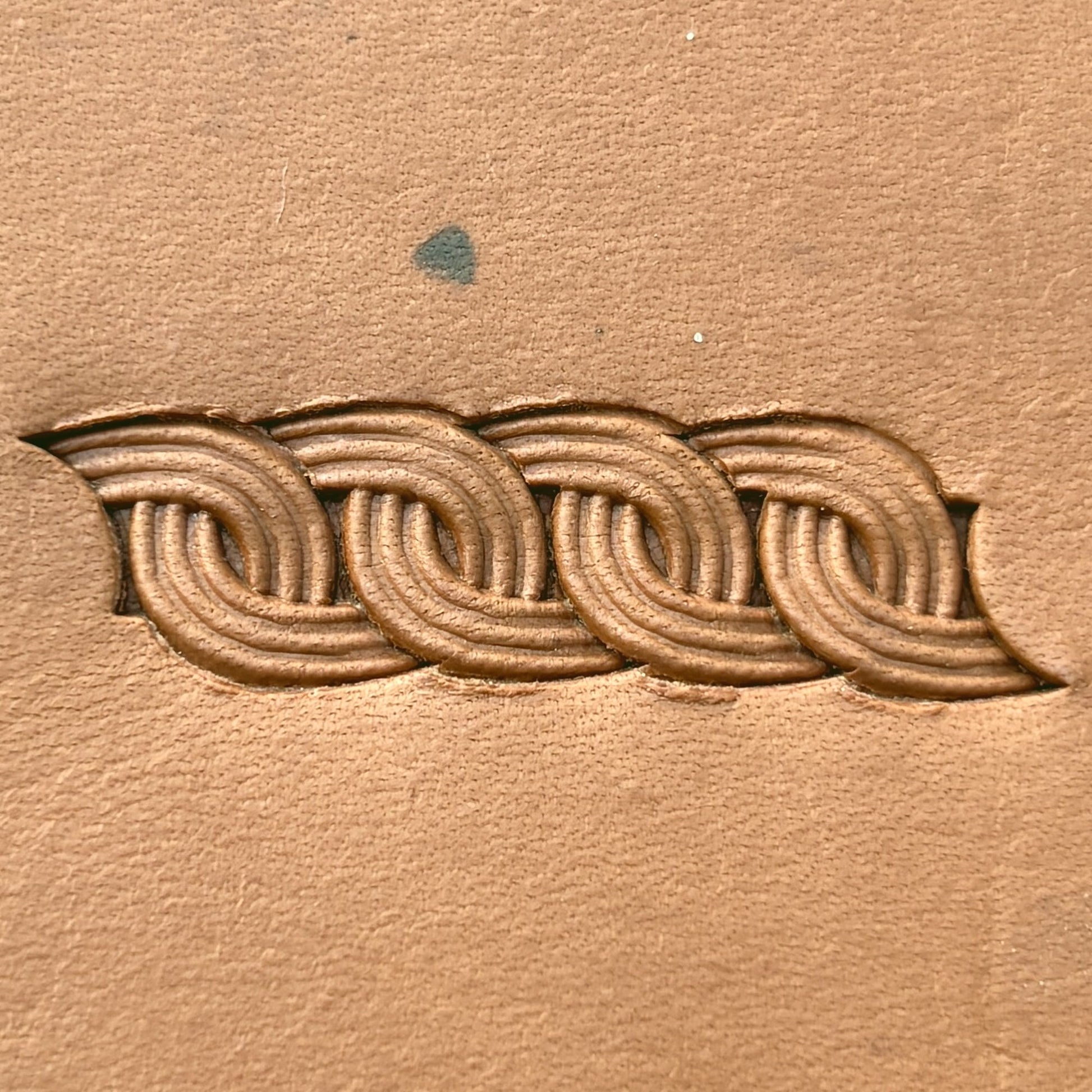 Interlock Basket Weave leather stamp LT602 — pattern imprint on veg-tan leather