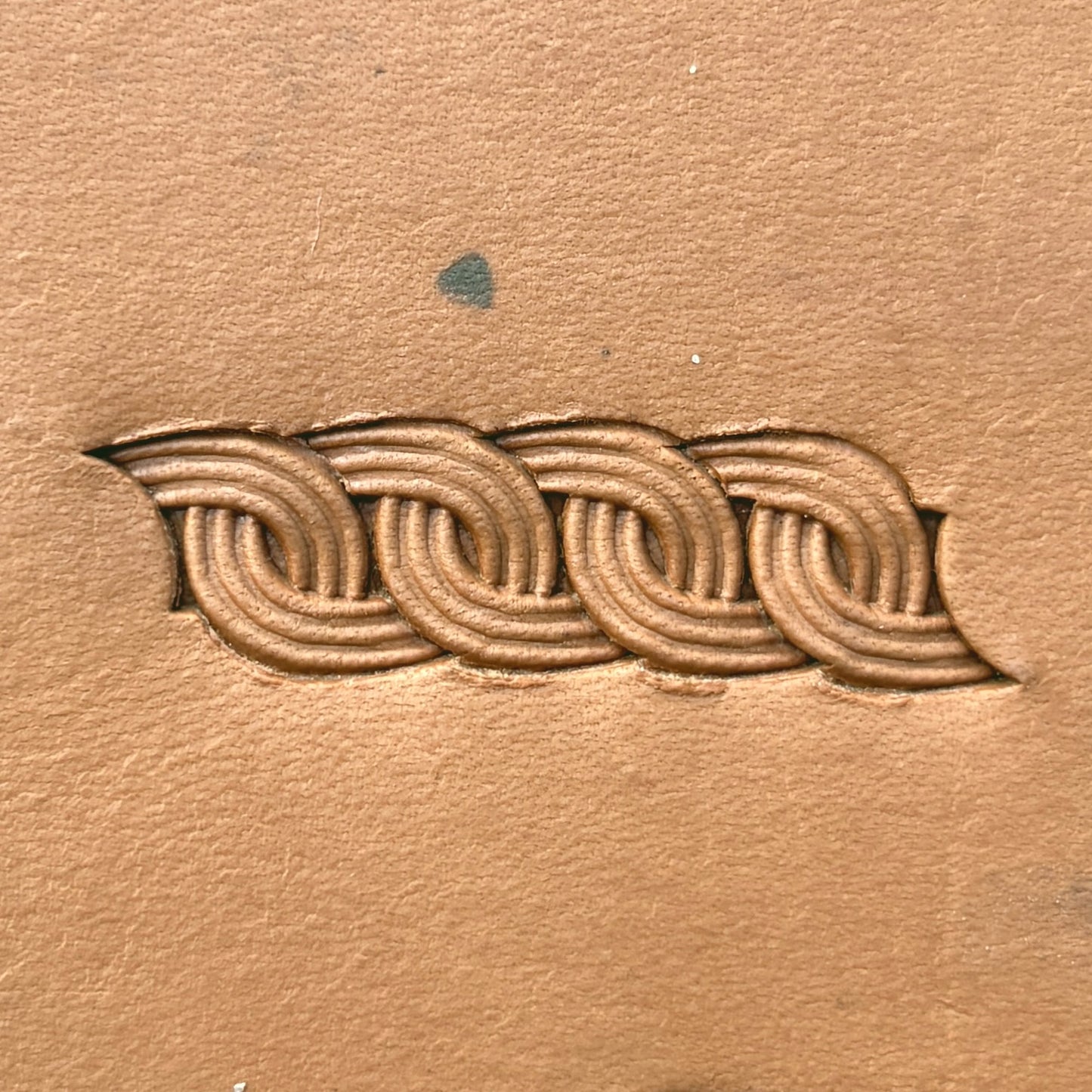 Interlock Basket Weave leather stamp LT602 — pattern imprint on veg-tan leather
