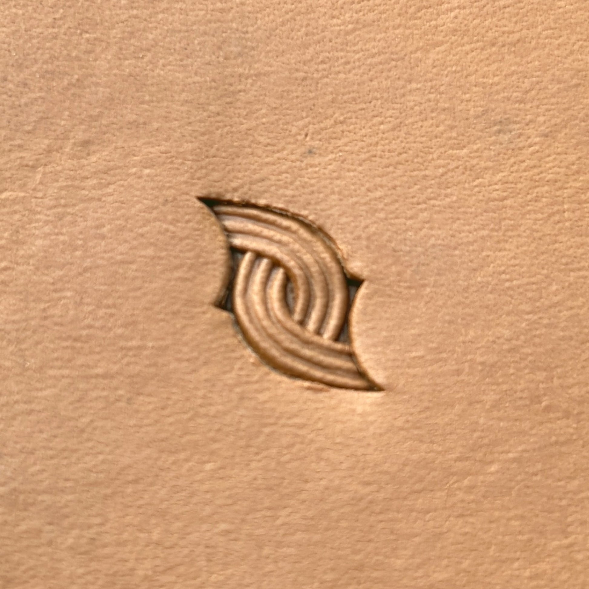 Interlock Basket Weave leather stamp LT602 — single impression on veg-tan leather