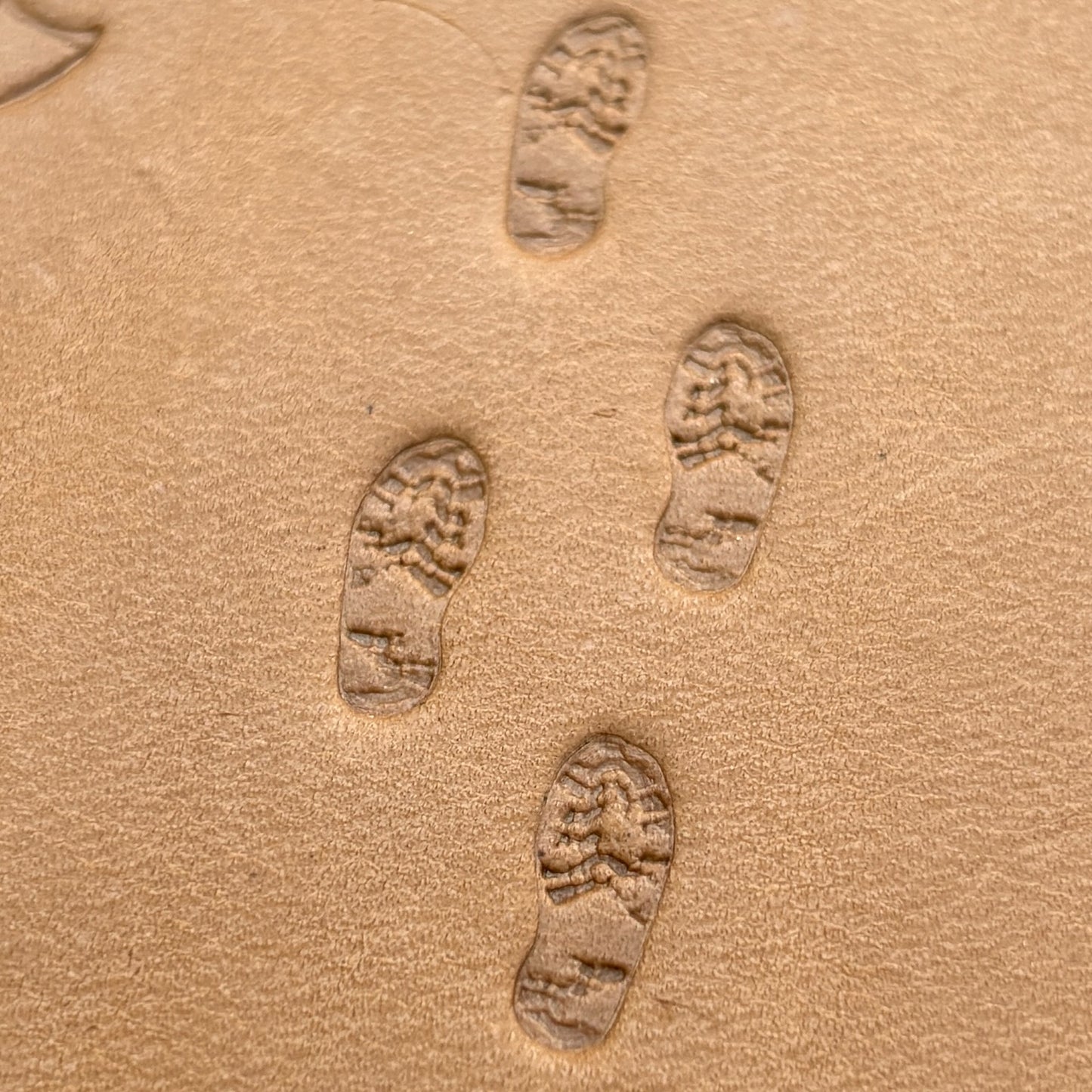 Trail Steps Footprint leather stamp LT604 — pattern imprint on veg-tan leather