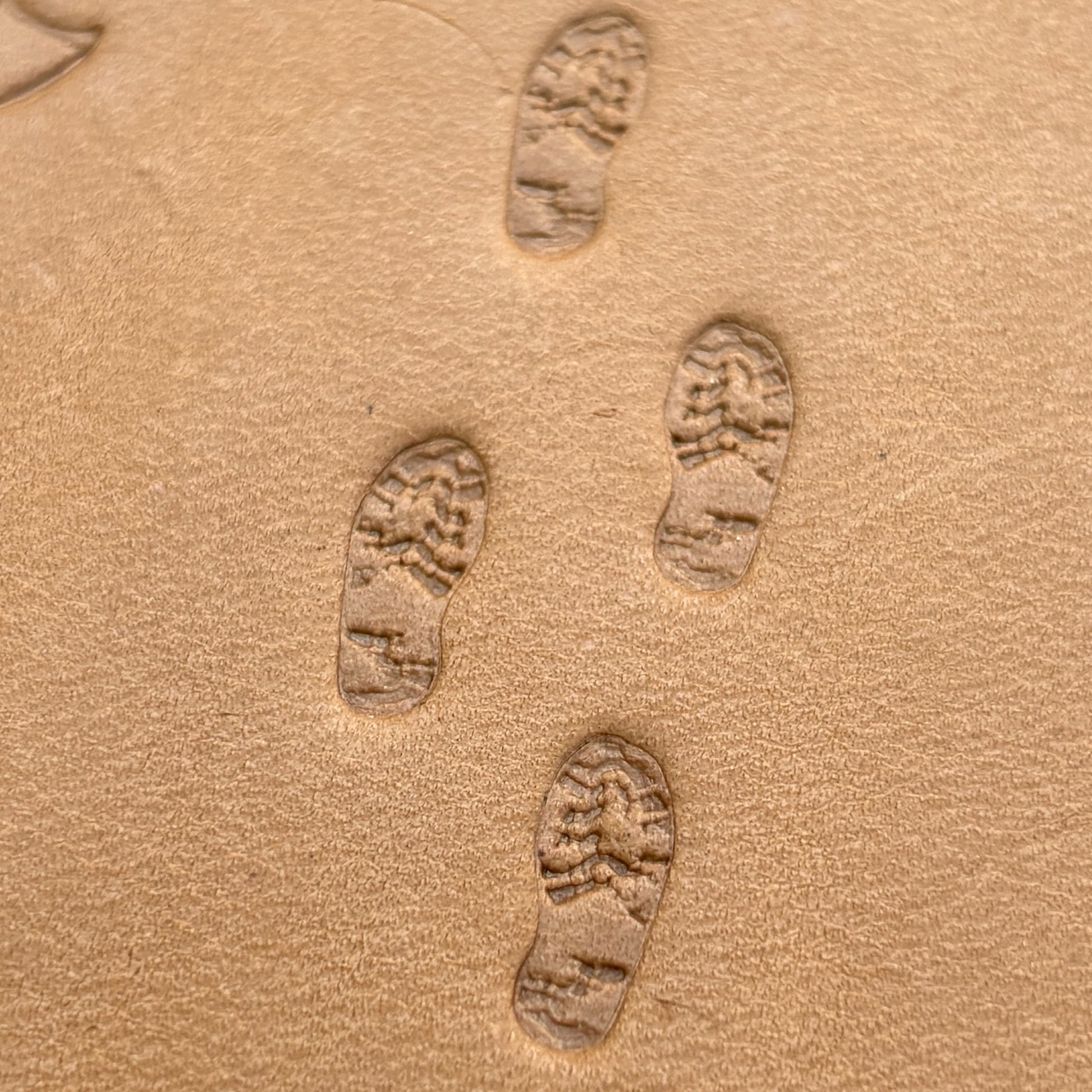 Trail Steps Footprint leather stamp LT604 — pattern imprint on veg-tan leather